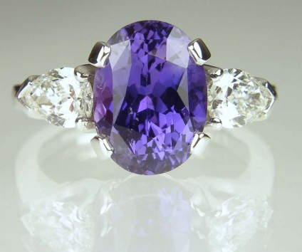 Purple sapphire & diamond ring - 4.27ct oval purple colour change natural certified unheated sapphire, set with 0.80ct pair of pear cut diamonds G colour VS clarity, in platinum.