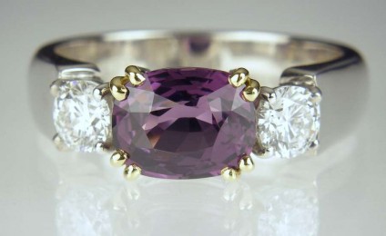 Purple Spinel & Diamond Ring - 2.73ct cushion cut deep magenta purple spinel set with a matched pair of 42pt round brilliant cut diamonds in E colour SI clarity with GIA certificates, mounted as a ring in 18ct white & yellow gold