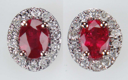 Ruby & diamond earstuds in 9ct white gold - 0.40ct pair of oval cut rubies, surrounded by a delicate halo of tiny diamonds. Total diamond weight is 0.10ct, set as earstuds in 9ct white gold. Earstuds are 5x6mm oval.