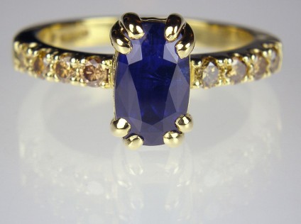 Sapphire & golden diamond ring in gold - 2.74ct Sri Lankan blue sapphire set with 0.39ct golden yellow diamonds in 18ct yellow gold			
		
