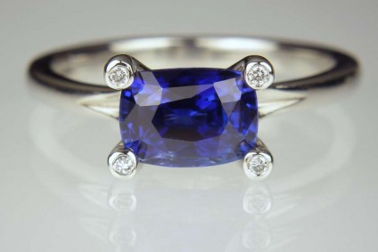 Sapphire & diamond ring in platinum - 2.13ct finest colour blue, cushion cut sapphire set with tiny diamond set claws in platinum ring
