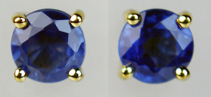 Sapphire earstuds in 9ct yellow gold - Pair of round cut blue sapphires clawset in 9ct yellow gold