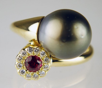 Tahitian pearl, ruby and diamond ring - !2mm round Tahitian pearl set with 3mm round ruby and 1.2mm round diamonds in 18ct yellow gold