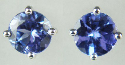 5mm tanzanite rounds set in 9ct white gold earstuds - 0.65ct pair of 5mm round tanzanites claw set in 9ct white gold earstuds
