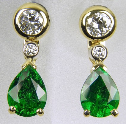 Tsavorite & diamond earrings - Pair of earrings consisting of 2 x 20pt diamond studs with detachable diamond and green tsavorite garnet drops in 18ct gold.