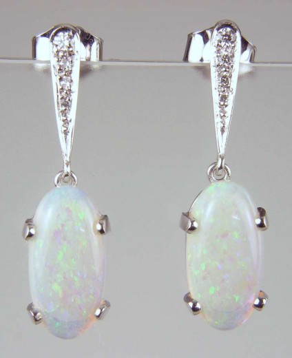 Opal & diamond earrings - 4.86ct white opal ovals set with 0.07ct white diamonds in 18ct white gold