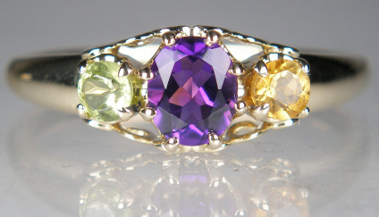 Birthstone ring in 9ct yellow gold - Vintage style ring set with oval amethyst, round citrine and peridot all mounted in 9ct yellow gold. The birthstones represent close family members of the client.