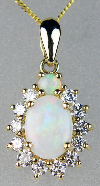 Opal & diamond pendant in 9ct yellow gold - 1.363ct oval white opals set with 0.32ct diamonds in 9ct yellow gold suspended from an 18" 9ct yellow gold chain