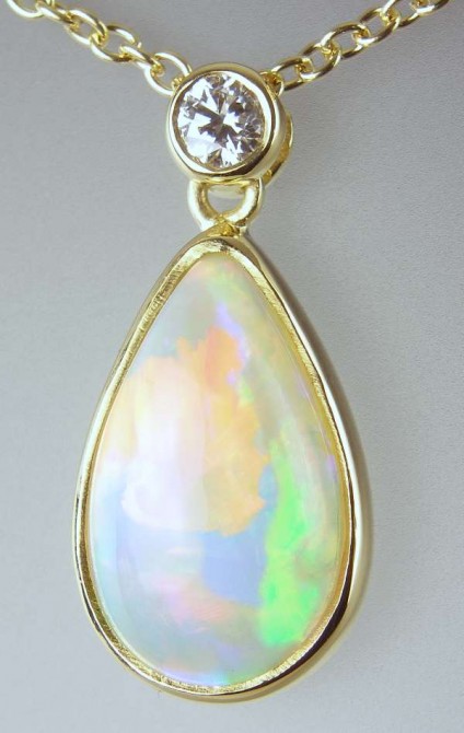 Opal & diamond pendant - 1.98ct pear cut cabochon white opal set with 0.07ct FG/VS diamond in 18ct yellow gold on adjustable 18ct yellow gold chain