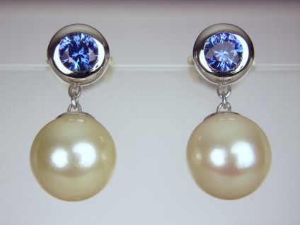 Sapphire & Pearl earrings - Round brilliant cut sapphire pair 0.56ct total weight set asstud earrings with detachable pearl drops.  The pearls were chosen to match the customer's Granny's pearl necklace.  The studs can be worn with or without the pearl drops.  In 18ct white gold.